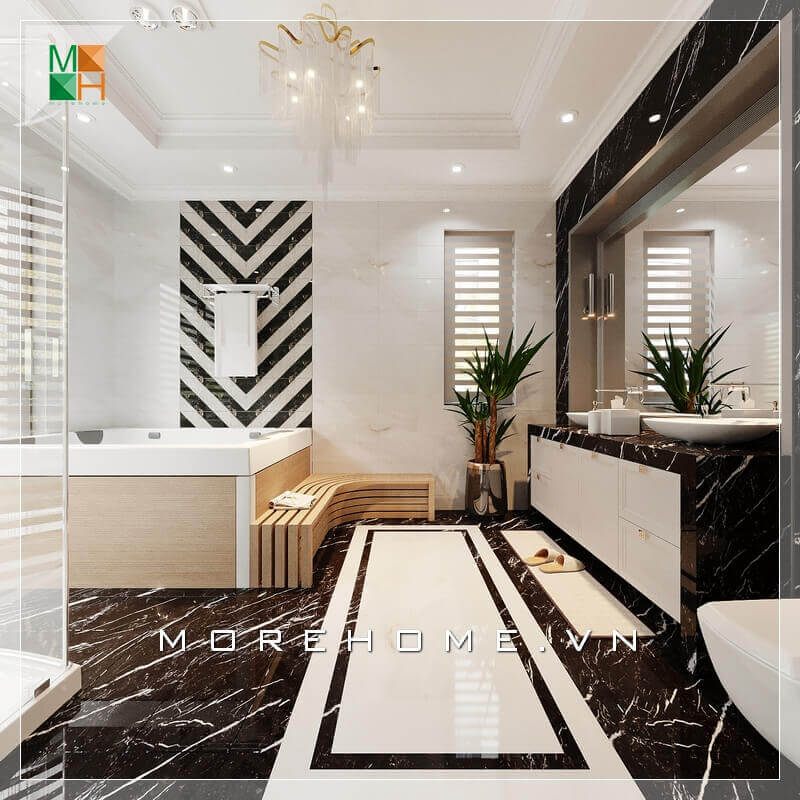 Ấn tượng với mẫu thiết kế nội thất phòng tắm hiện đại pha chút cổ điển của chiếc đèn chùm treo trần nhà,tinh tế từ việc lựa chọn màu sắc đến cách sắp xếp nội thất hợp lý, gạch ốp tường trắng kết hợp gạch lát sàn màu đen trắng là sự kết hợp hài hòa khiến phòng tắm trở nên đồng điệu và cuốn hút.