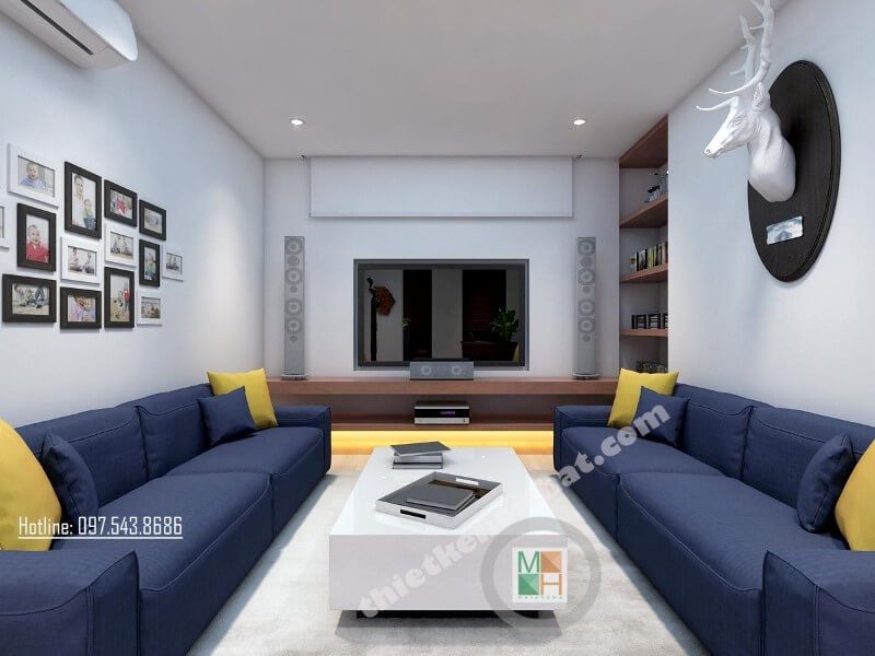 Trang trí nội thất phòng khách đẹp với bộ sofa bọc vải màu xanh